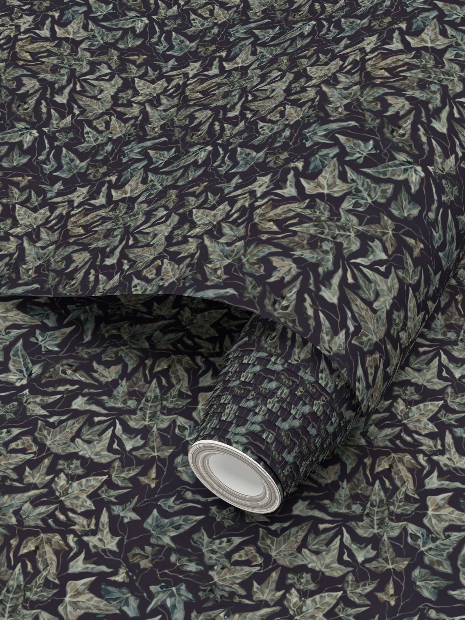 Roll of wallpaper featuring a ivy pattern on a dark grey background.