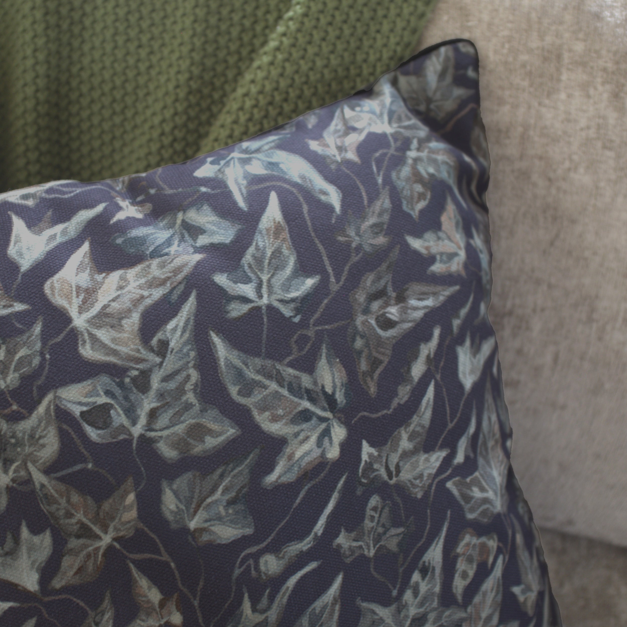 Floral-patterned pillow on a textured surface