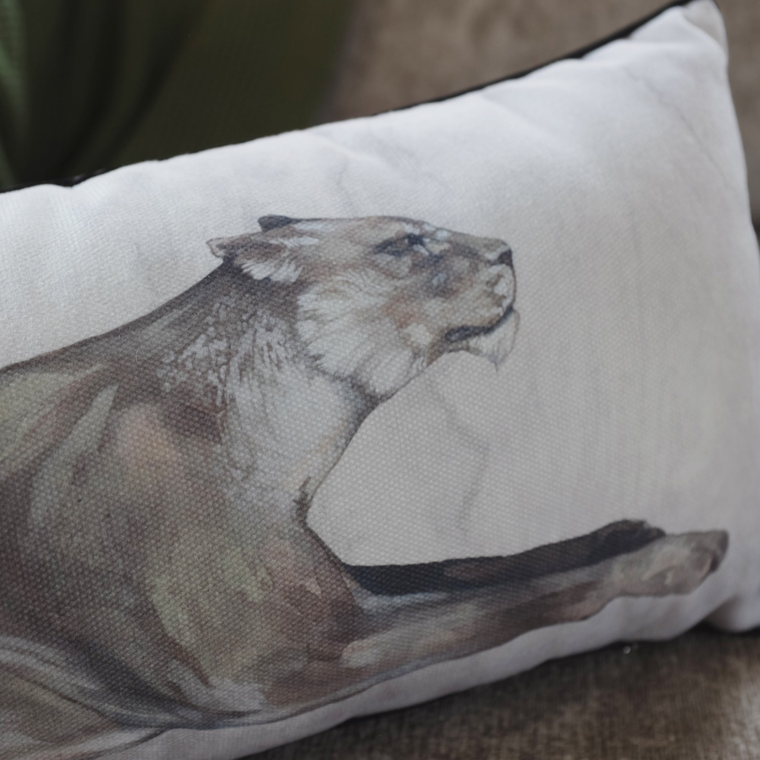 Pillow with a lion design on a neutral background